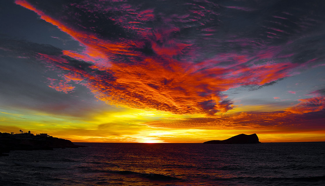 atardecer ibiza cala conta